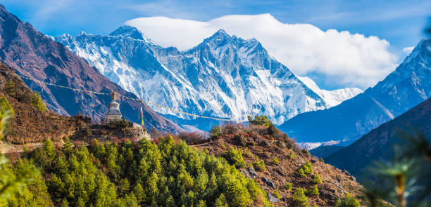 istock Mt Everest overlooking Buddhist Stupa Prayer Flags Himalayas mountains panorama 1452146770