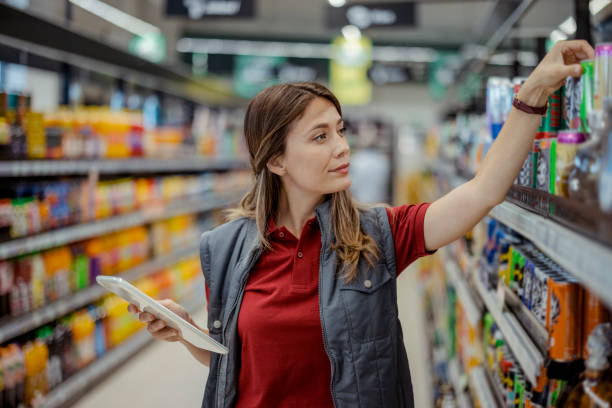 istock Female supermarket staff 1452147938