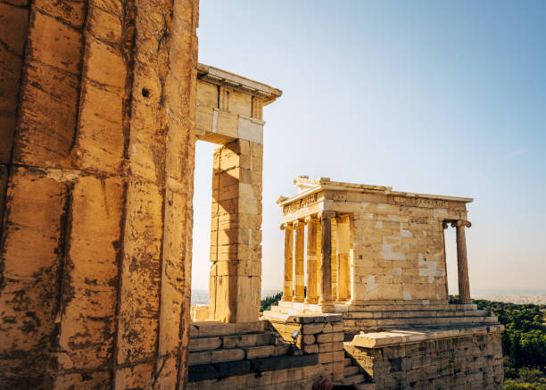 View of the Temple of Athena Nike from the Propylaia on the Acropolis in Athens Greece at dusk