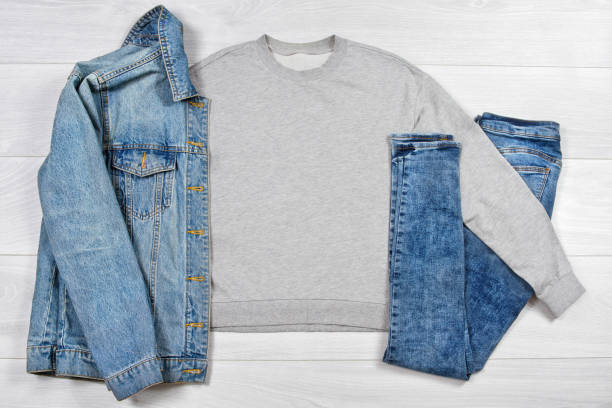 istock Close up gray blank template sweatshirt hoodie with copy space. Top view mockup pullover on white wooden background. Casual outfit. Flat lay template jeans clothes. 1452152769
