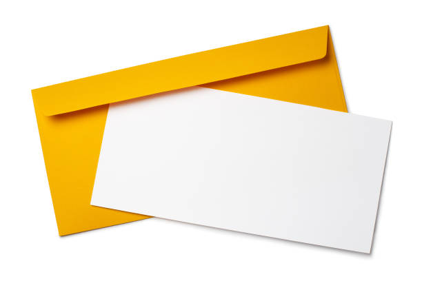 istock Blank white paper on yellow envelope on white 1452153115