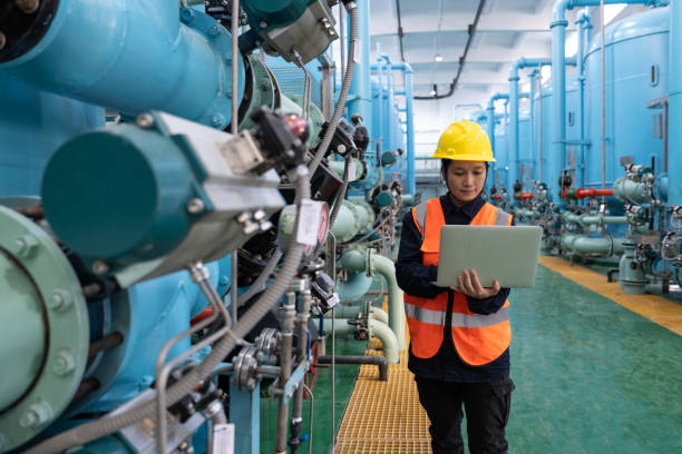 istock A female engineer works in a chemical plant using a laptop computer 1452166371