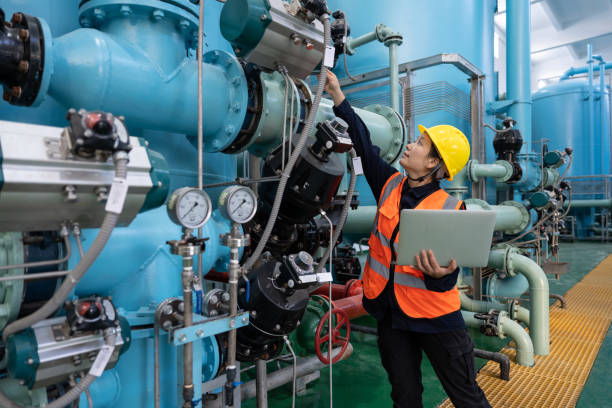 istock A female engineer works in a chemical plant using a laptop computer 1452166503