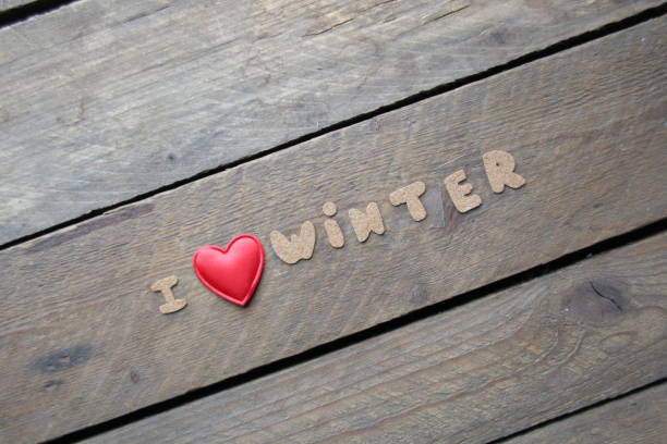 I love winter, inscription on a wooden table. Creative concept.