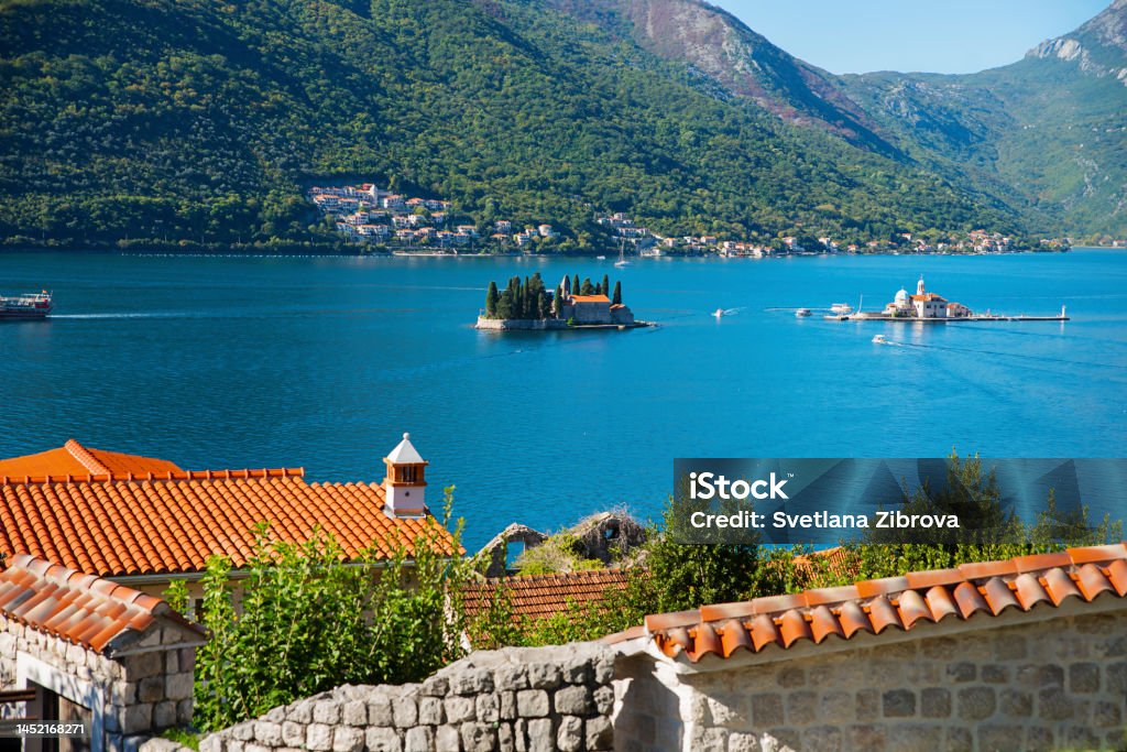 island of St. George and the island of Gospa od Shkrpela Opposite Perast are two islands: the island of St. George and the island of Gospa od Shkrpela Montenegro Stock Photo