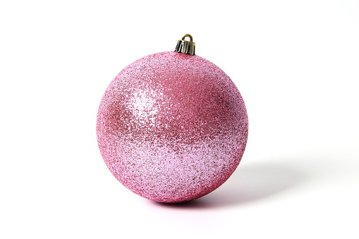 Pink christmas ball isolated on white background