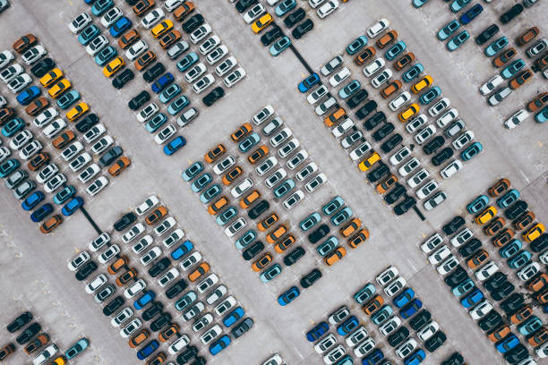 Aerial View of Rows of New Cars Aerial View of Rows of New Cars car dealership stock pictures, royalty-free photos & images