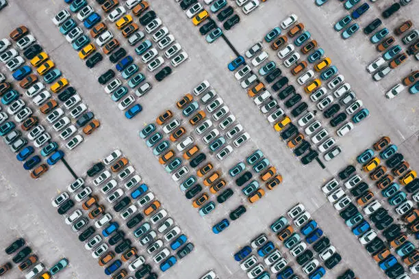 Photo of Aerial View of Rows of New Cars