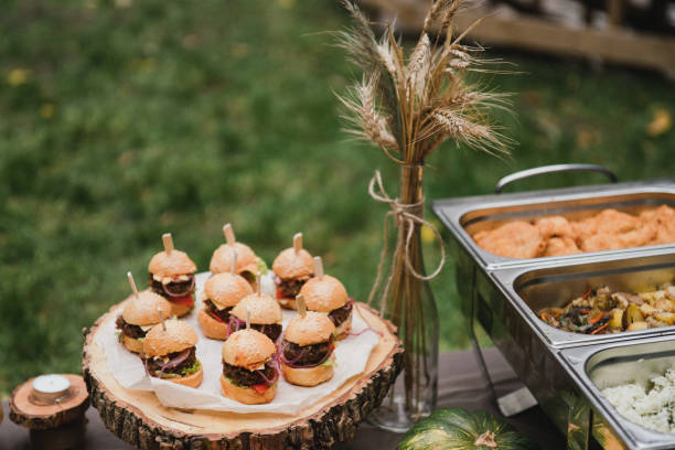 istock Catering banquet table at the reception. Casual wedding party. 1452173859