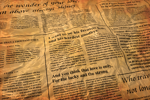 Curled old nostalgic love newspaper