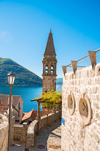 Tower in the city of Perast. Mountain View.