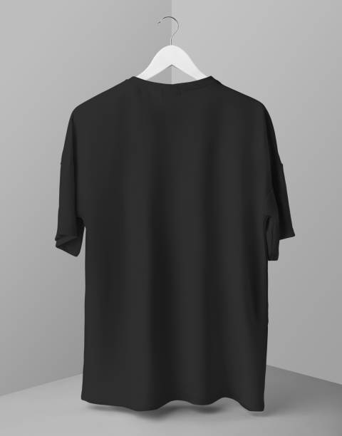 istock Oversized black t-shirt mockup on a wooden hanger, clothes hanging over a cube, for design, advertising, back view. 1452181775