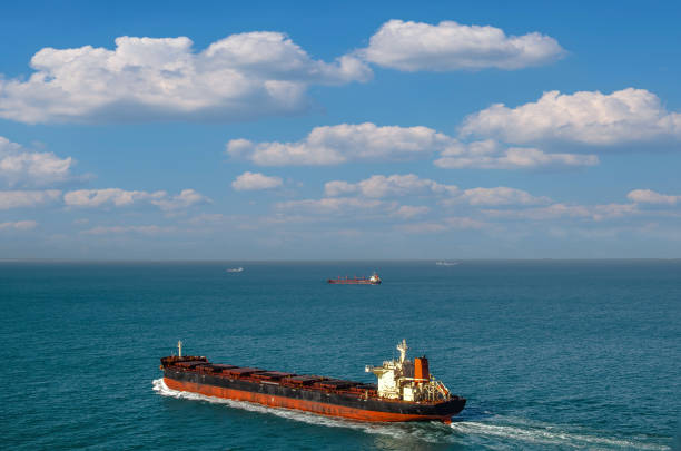 istock Nice aerial view of a cargo ship sailing at sea 1452190107
