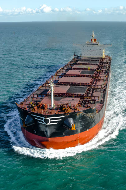 istock Nice aerial view of a cargo ship sailing at sea 1452191495