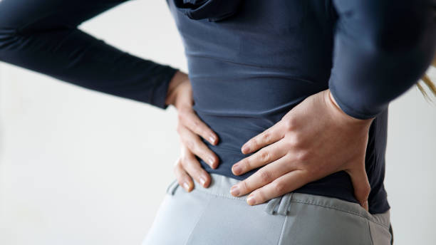 istock Woman suffering from back pain 1452212702