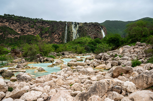 view of the Salto del Usero nature reserve with eroded sandstone cliffs and colorful pools of water