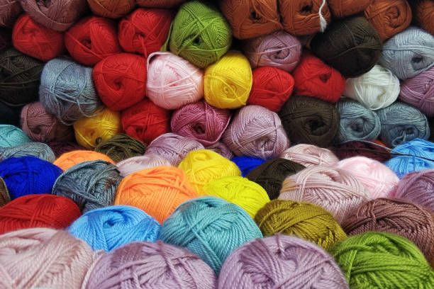 istock Multi colored balls of wool background 1452227013