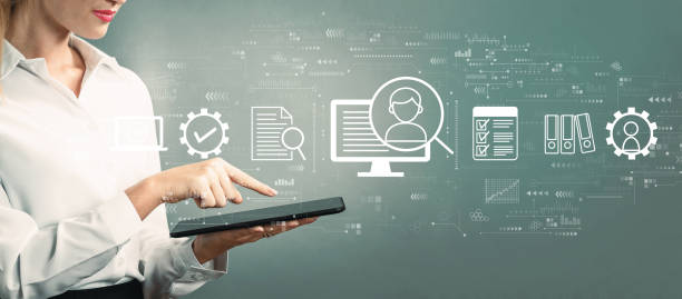 istock Document management system concept with business woman using a tablet 1452228157