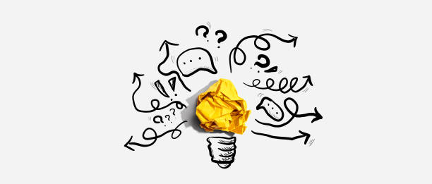 istock Brainstorming concept with a crumpled paper light bulb 1452228327