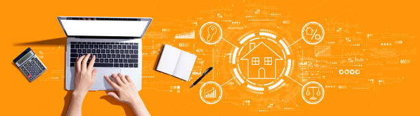istock Real estate theme with person using a laptop 1452228333