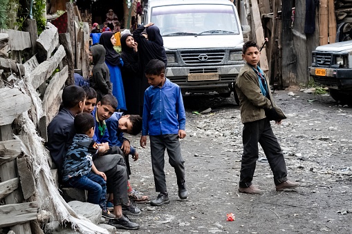 Kashmir, India – July 27, 2022: A closeup view of a group of young boys on the street of Kashmir, India.