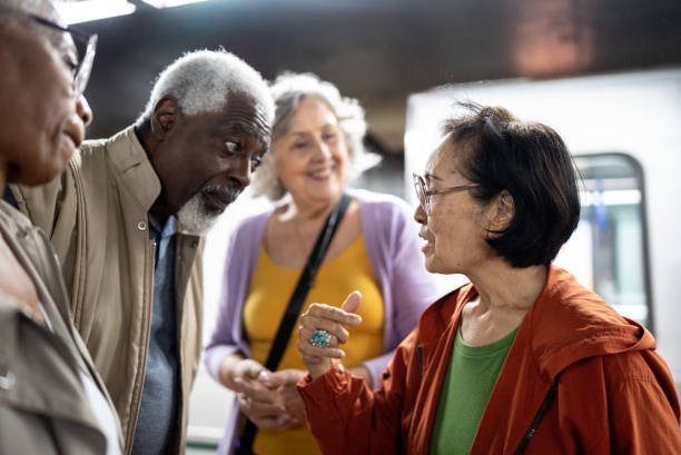 istock Senior friends talking in a subway 1452234277