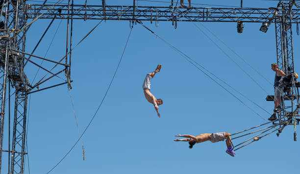trapeze artists acrobats stock photo