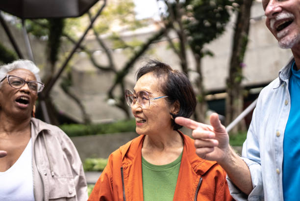 istock Senior friends talking outdoors 1452235976