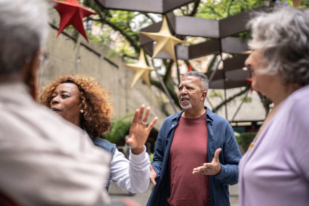 istock Senior tourists talking outdoors 1452236024