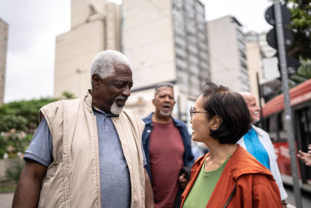 istock Senior tourists talking outdoors 1452236071