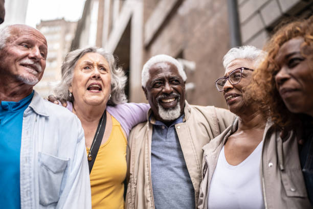 istock Senior tourists talking embraced outdoors 1452237151