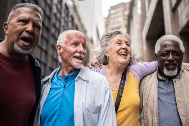 istock Senior friends embracing outdoors 1452240810