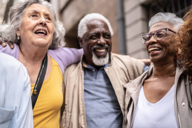 istock Senior friends embracing outdoors 1452240812