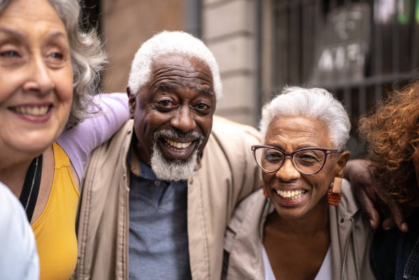 istock Senior friends embracing outdoors 1452240825