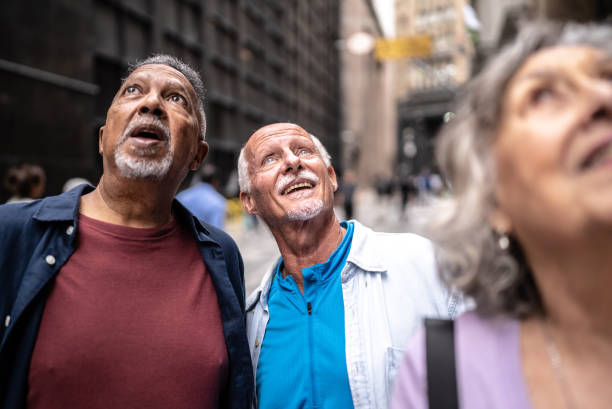 istock Senior tourists looking up outdoors 1452240826