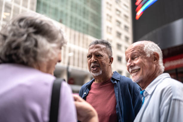 istock Seniors friends talking outdoors 1452240829