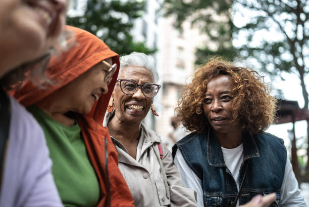 istock Senior friends talking outdoors 1452240898