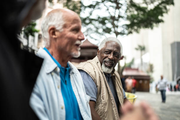 istock Senior friends talking outdoors 1452240936