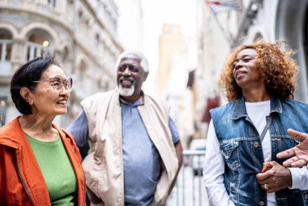 istock Senior friends talking outdoors 1452241647