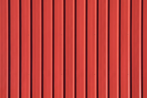 istock red metal sheet roofing and walling 1452246187