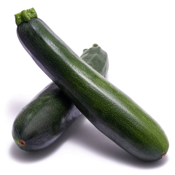 istock green natural organic zucchini vegetable isolated on white background 1452254506