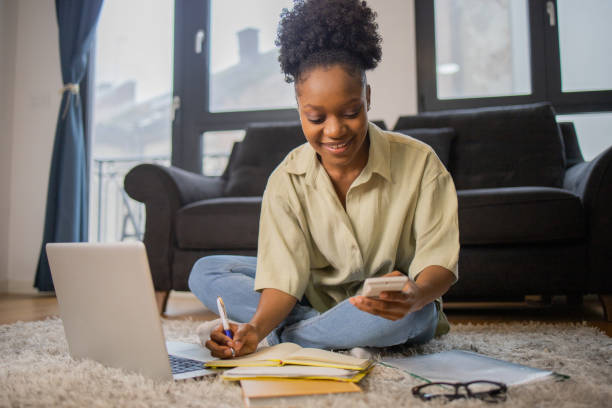 istock Young woman working from home 1452255862