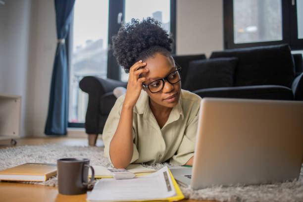 istock Young woman working from home 1452255877