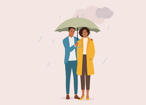 Smiling Black Young Couple With Umbrella On A Rainy Day With Dark Clouds. Isolated On Color Background.
