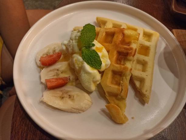 istock waffle served with ice cream and on a white plate 1452257750