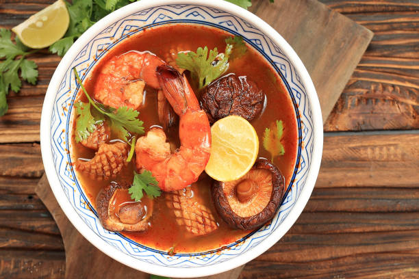 istock Tom Yam Kung, Prawn and Lemon Red Soup with Squid and Mushrooms 1452260302