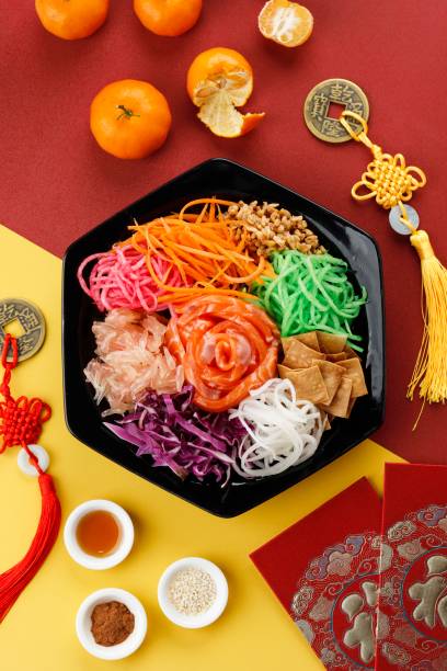 Salmon Yee Sang or Yusheng, a Chinese New Year Celebration Dish stock photo