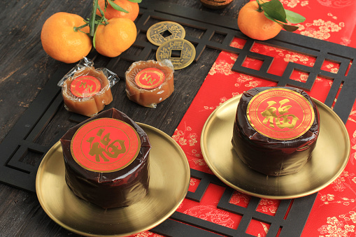 Nian Gao or Glutinous Rice Cake Kue Keranjang. Chinese Red Concept. Chinese Words is Fu Means Fortune.