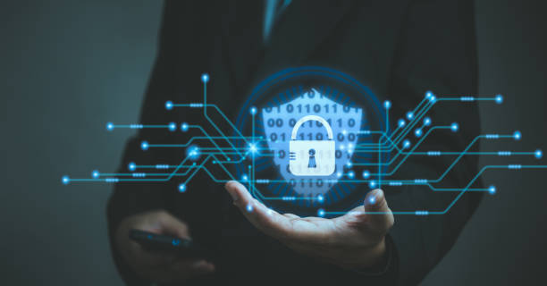 istock Businessman holding shield protect icon. Cyber security network. Padlock icon and internet technology networking security system. Business data personal information on virtual interface. 1452272504