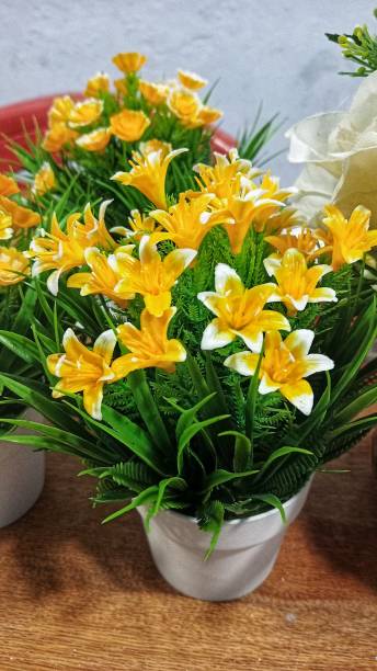 istock looks beautiful flower decoration plastic on the table 1452278187